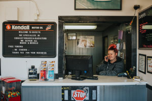 staff answering calls at Bucky's Tacoma Narrows Auto repair location