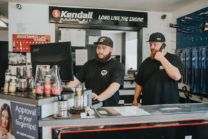 Bucky's silverdale auto repair staff helping plan a repair