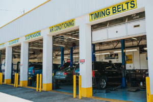 Cars being repaired at Bucky's Shoreline Auto repair location in garages