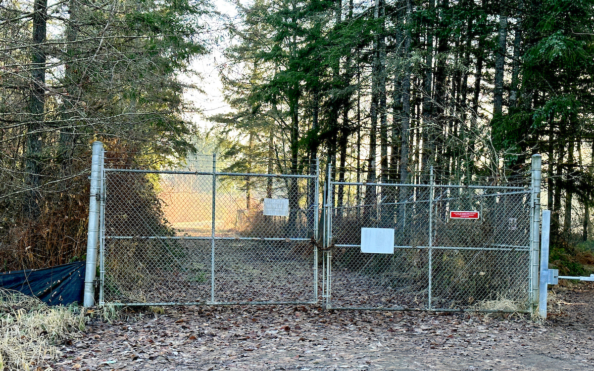 A fence barring access to a property.