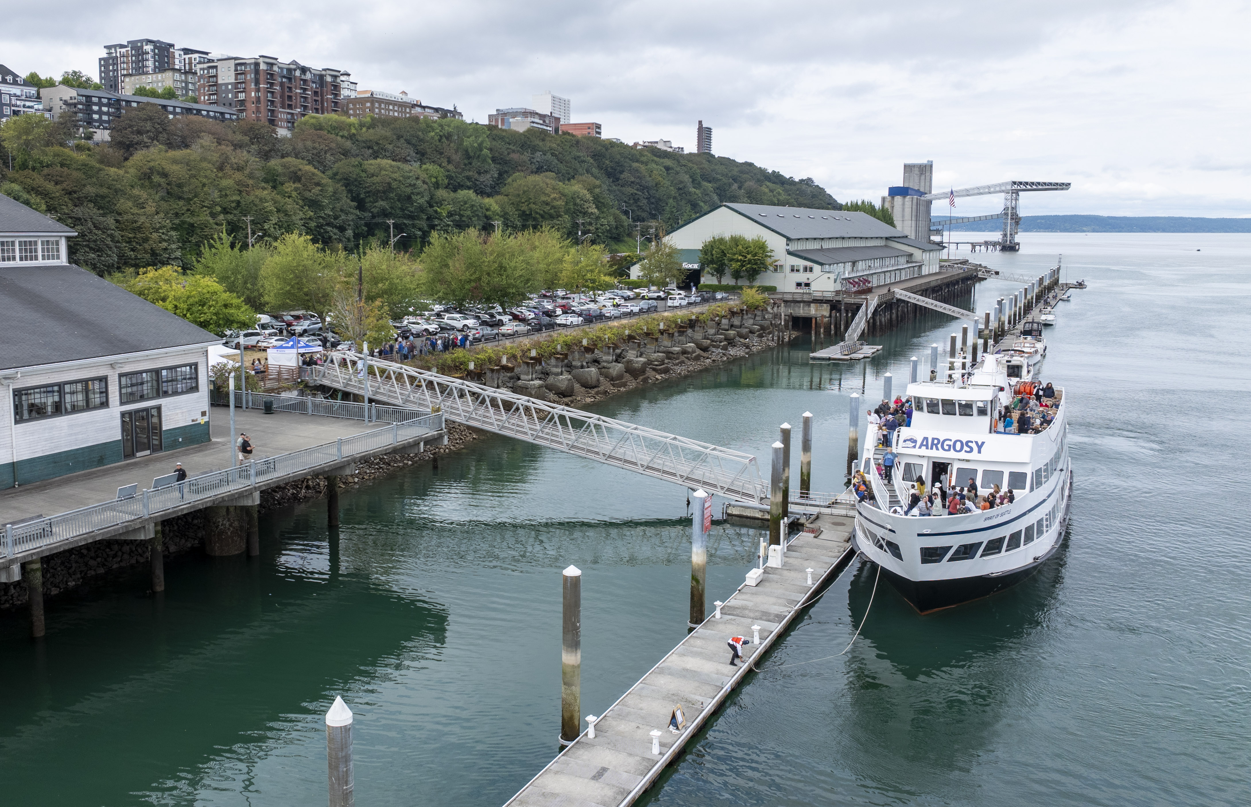 The Argosy boat The Spirit of Seattle docked in front of the Foss Waterway Seaport Museum