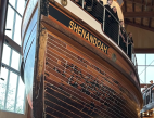 A large ship named Shenandoah inside a museum.