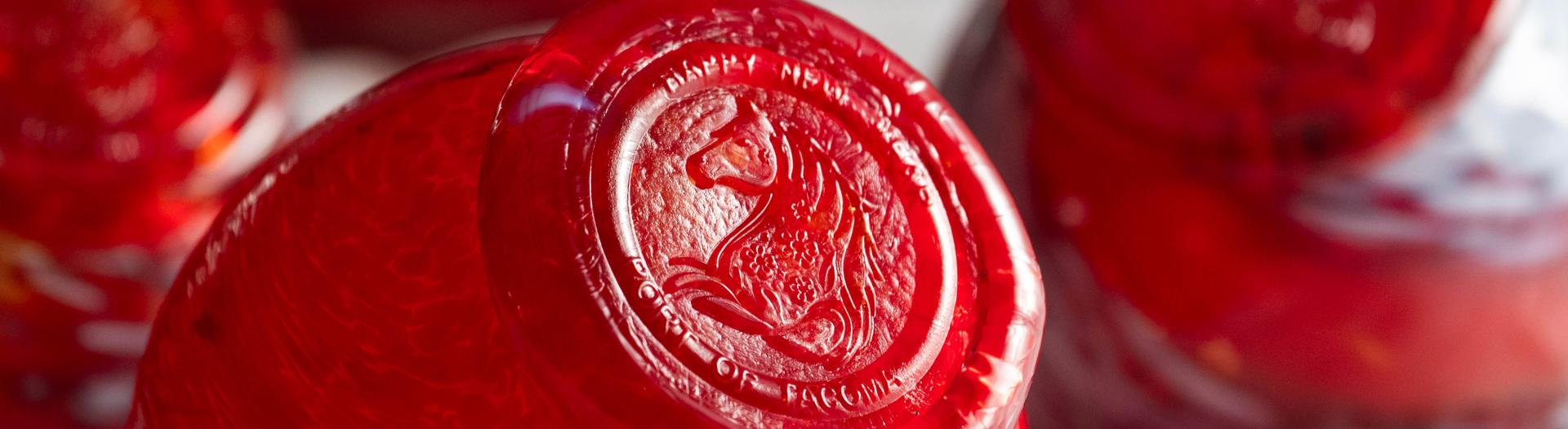 Close up shot of a red monkeyshine float with a horse