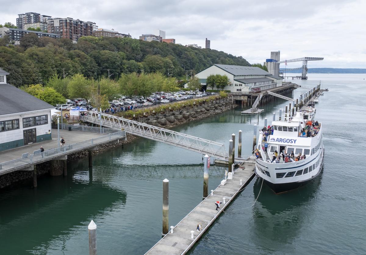 The Argosy boat The Spirit of Seattle docked in front of the Foss Waterway Seaport Museum