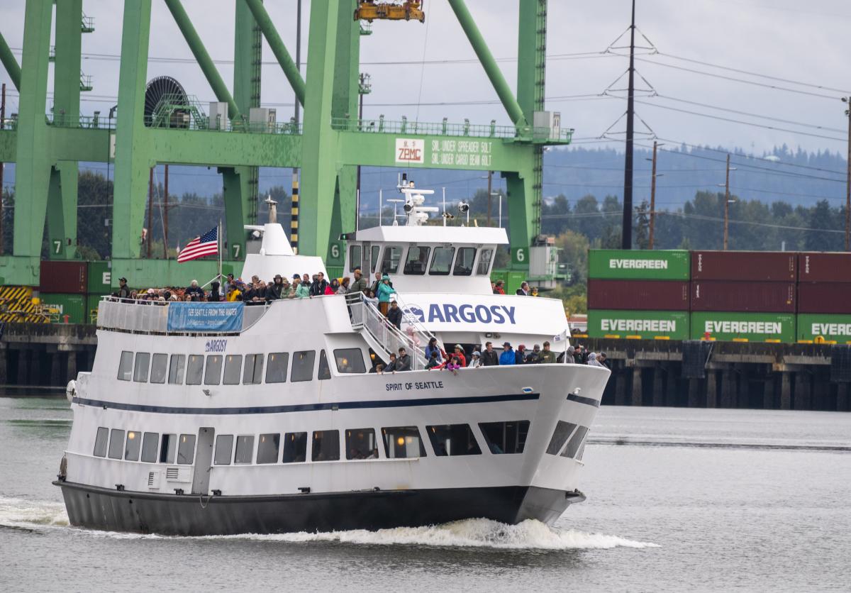 The Argosy Spirit of Seattle moves through a waterway on a Port boat tour.