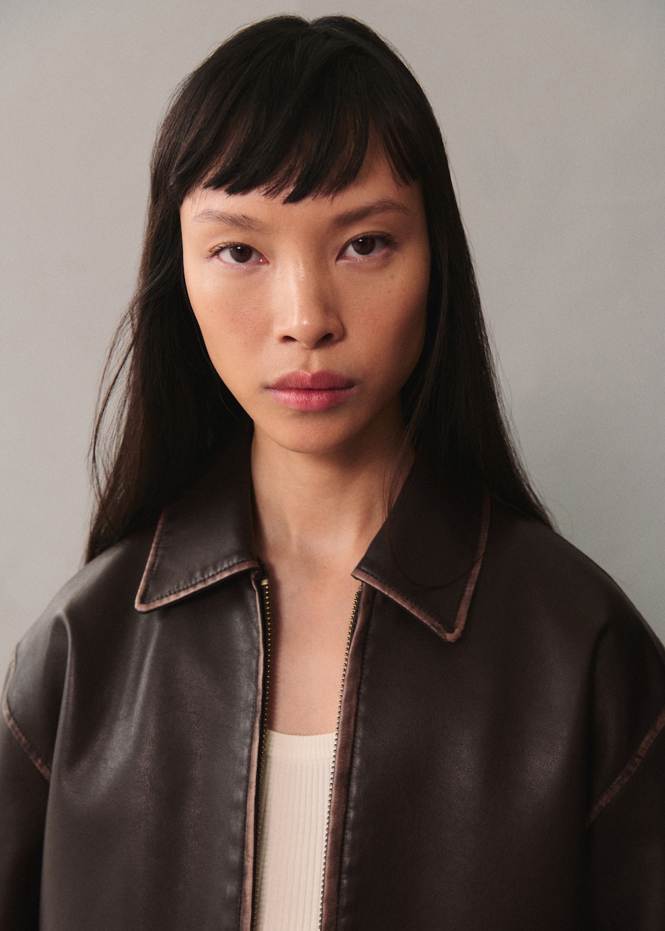 Leather-effect jacket with contrast stitching