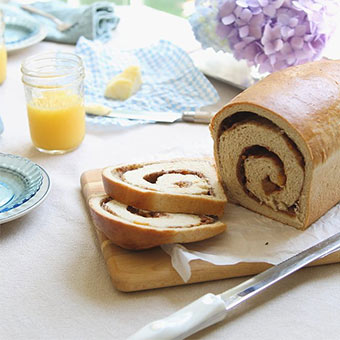 Receta de postre rollo de canela y durazno con Soyacen
