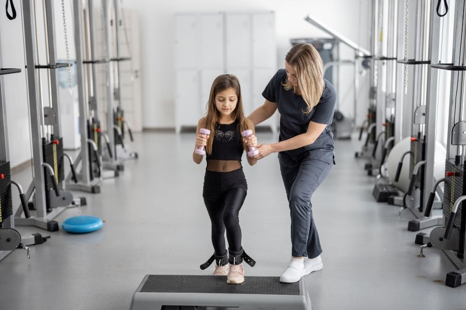How can adaptive equipment help individuals with limited hand dexterity perform daily tasks?