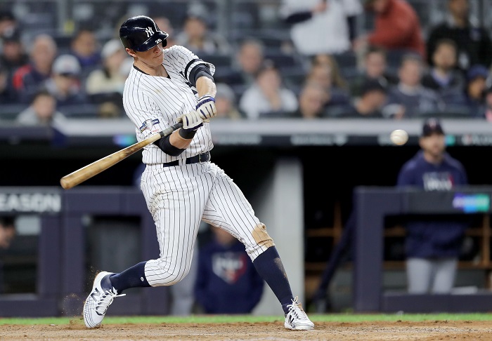 D.J. LeMahieu conectó jonrón y empujó cuatro de las diez carreras de los Yanquis sobre los Mellizos, en el primer juego de esta Serie Divisional de la Liga Americana. LA PRENSA/Elsa/Getty Images/AFP