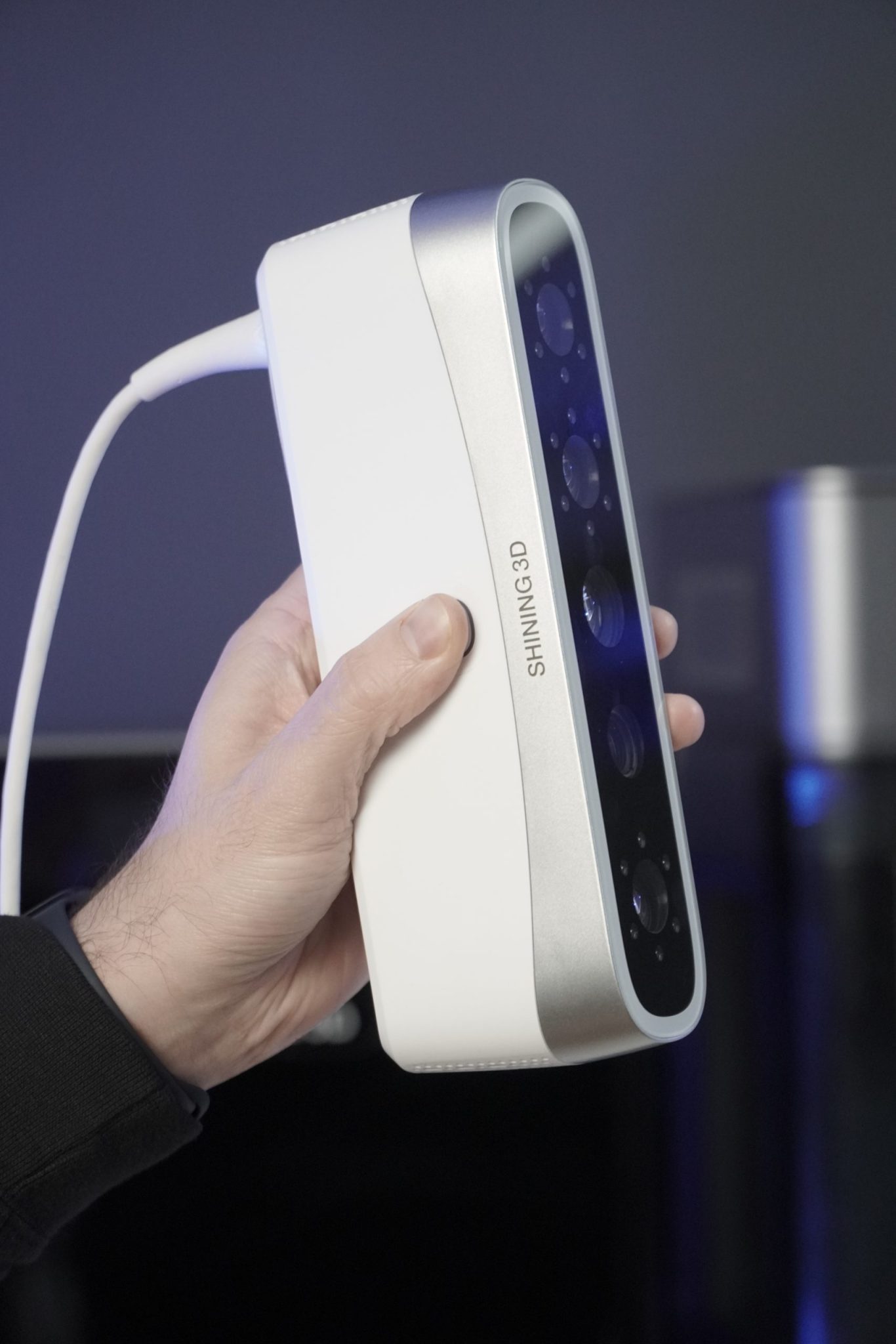 Metismile.Held.In.Hand.Vertically.Side.View