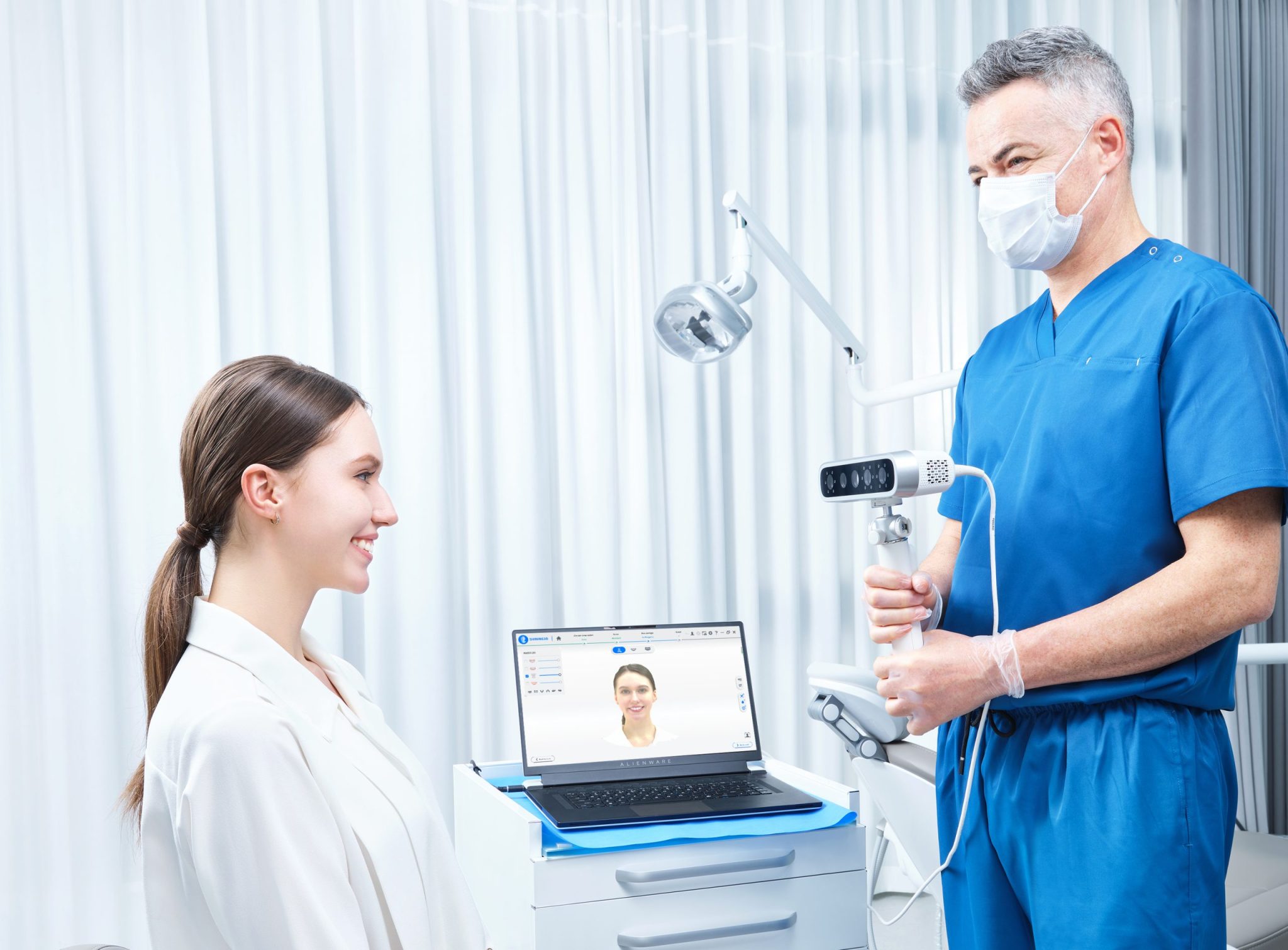 Metismile.Held.By.Doctor.Taking.Picture.of.Patient