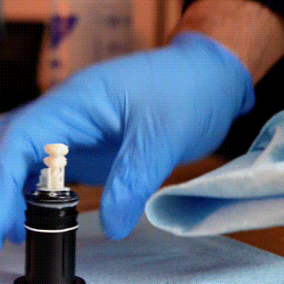 How-to-wipe-a-lumicera-ceramix-crown-sodium-dental GIF showing how to correctly wipe a Ceramix print
