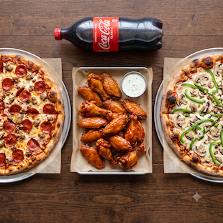 Presto! Pizza Family Feast spread with two X-Large pizzas, wings and soda