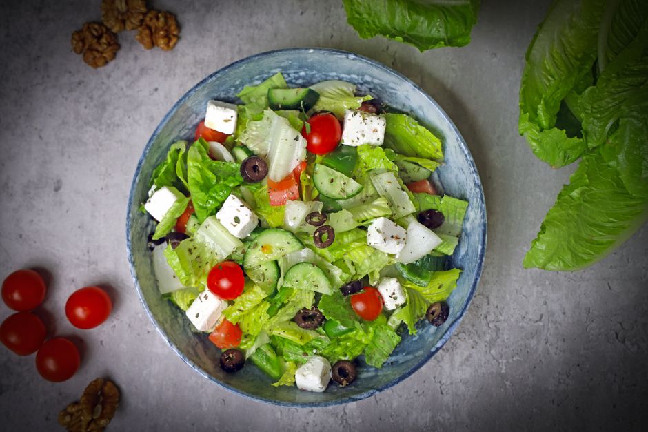 Horiatiki village salad at Thalassa — heirloom tomatoes Kalamata olives and slab of Dodoni PDO feta