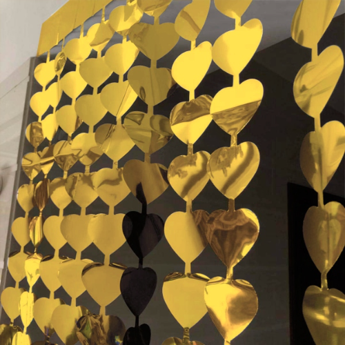 cortina corazón dorado