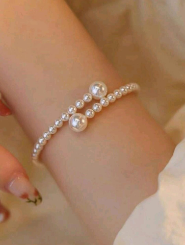 PULSERA DE PERLAS FALSAS AJUSTABLE