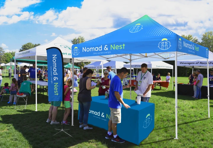 High-quality custom logo 10x10 tent at an outdoor event