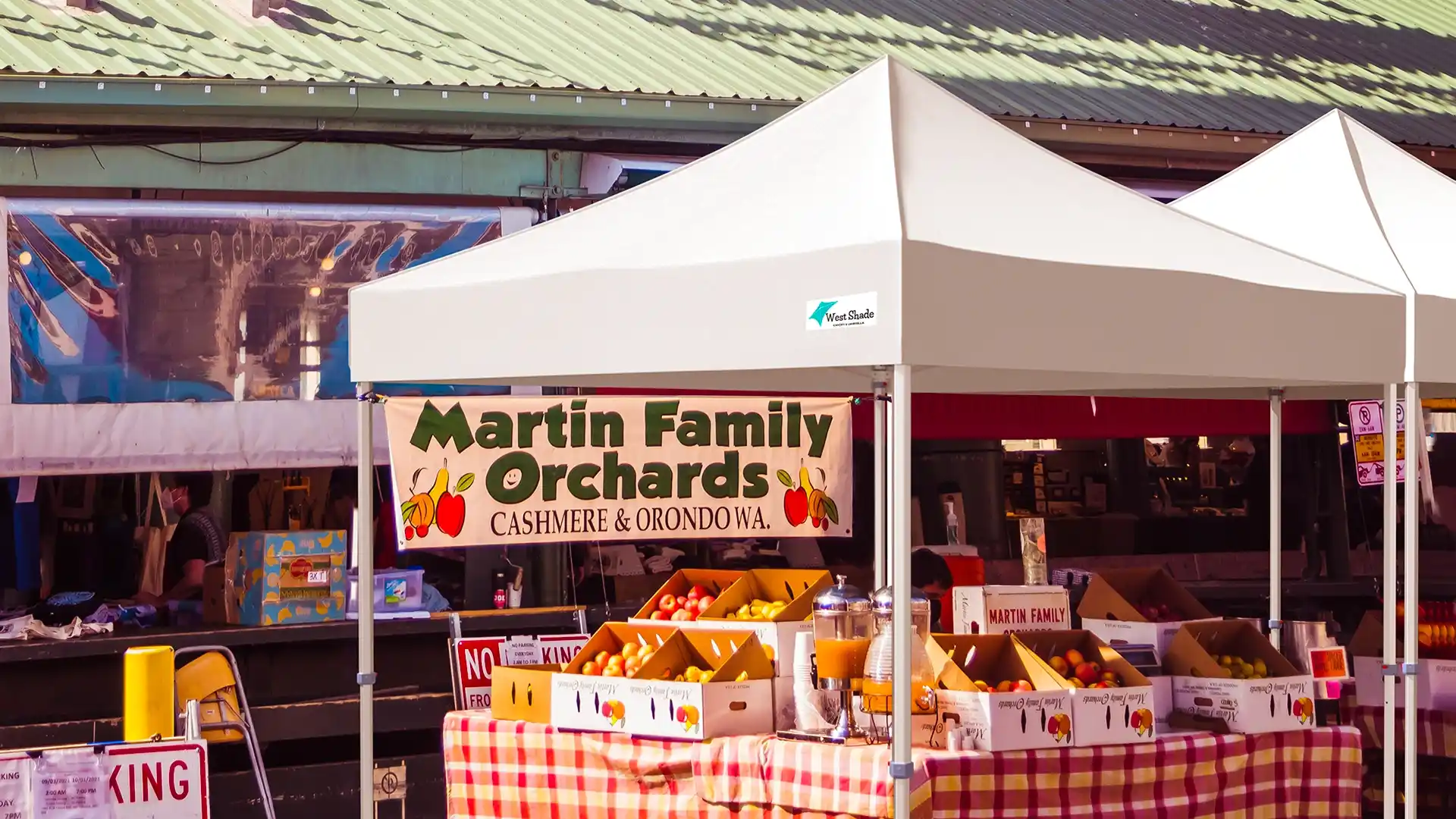 Use a custom canopy tent at the farmers market
