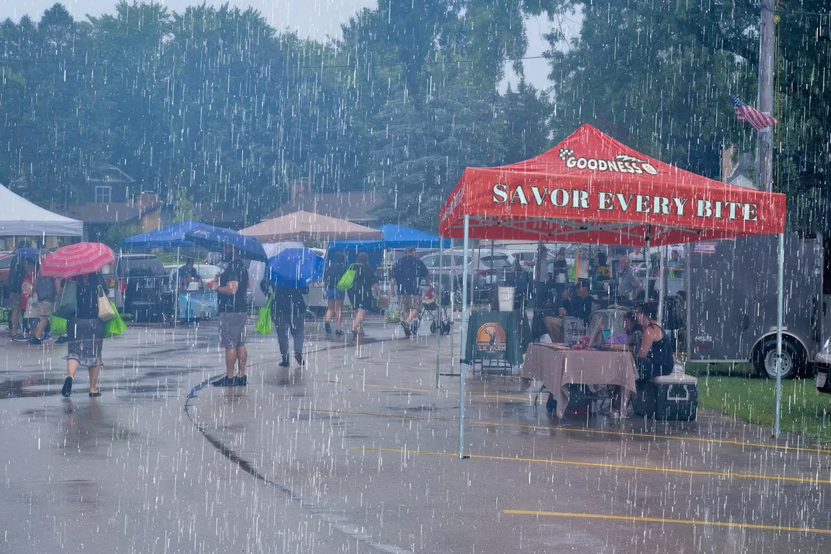 The tent keeps your booth dry during heavy rain.