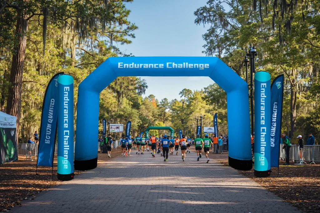 Set up inflatable signage for an outdoor marathon