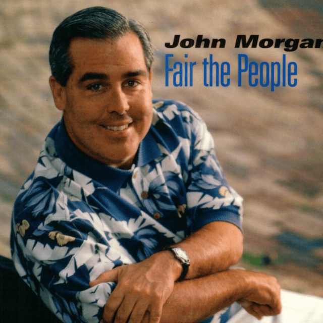 Smiling man in a blue floral shirt sits with arms crossed on a ledge. Background is blurred. Text reads, “John Morgan: Fair the People.”