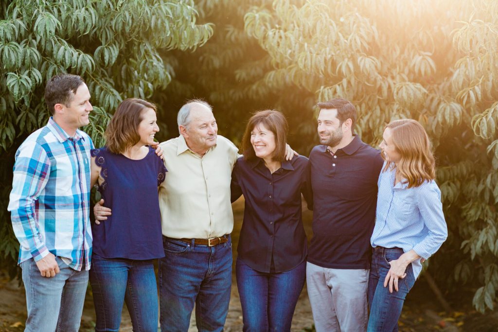 McClarty family in a peach orchard