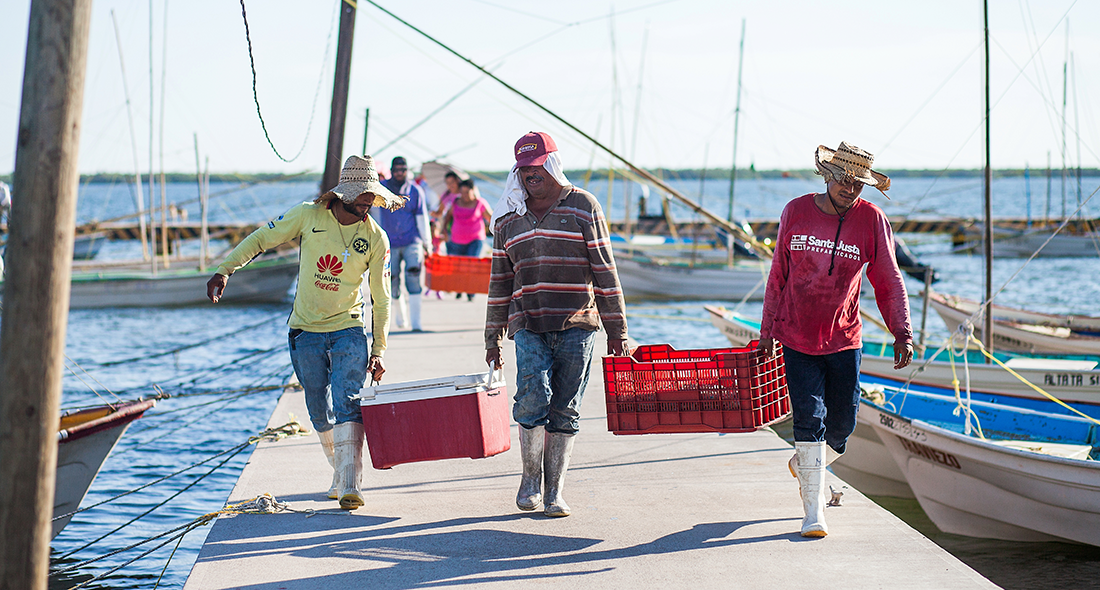 3 Fishermen carrying box.png