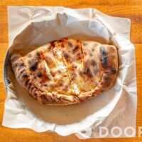 The Buck Meat Calzone