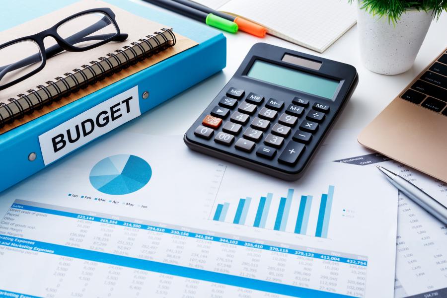 Image of paper displaying financial and budget planning with chart report