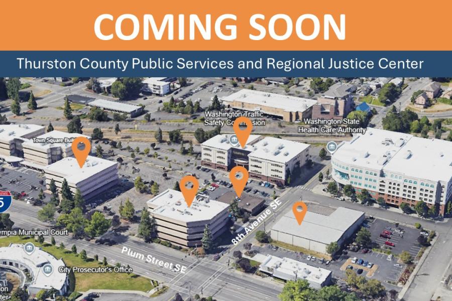 Overhead photo of multiple buildings in Downtown Olympia between Plum Street and Eighth Avenue.