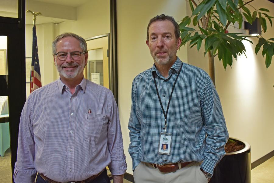 image is a photo of Thurston County Treasurer Jeff Gadman standing next to Thurston County Banking and Investment Officer Rodney Reynolds.
