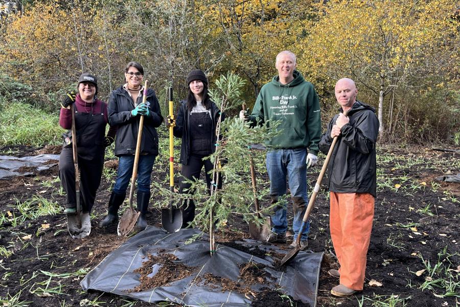 photo of thurston county's five elected board members with shovels at a tree planting project