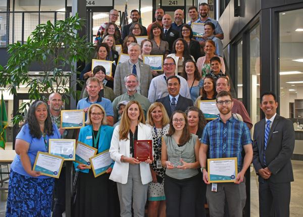 Group of Thurston County elected officials and employees gathered after an awards ceremony.