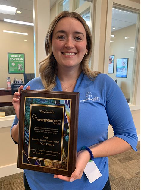 amanda reeve of edcu with thank you plaque