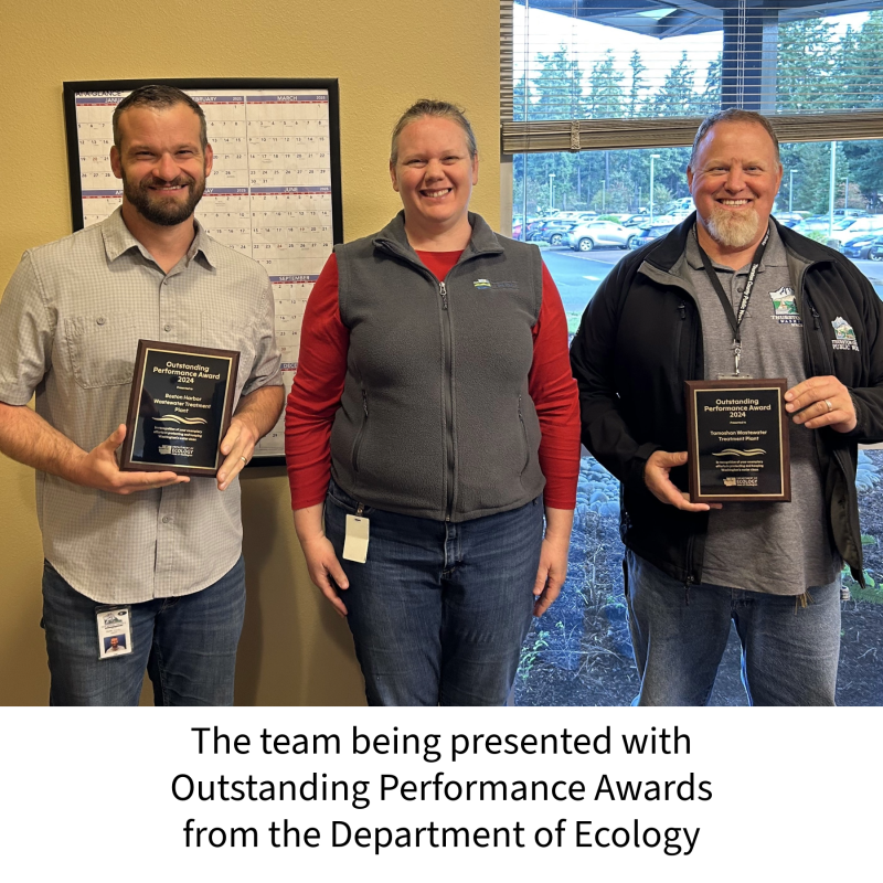 team being presented with outstanding performance award for Tamoshan and Boston Habor WWTP