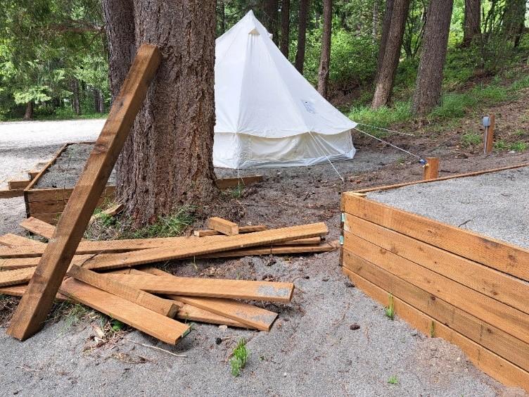 tent with boards around it