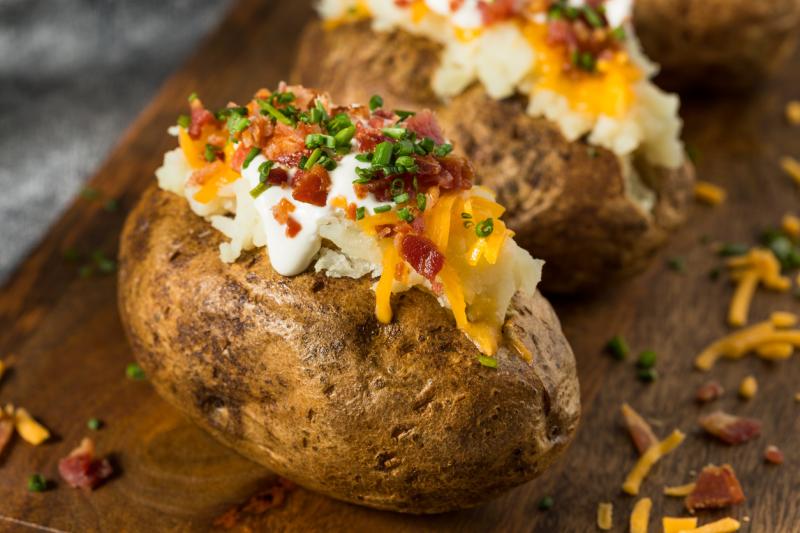 Homemade Loaded Baked Potatoes stock photo