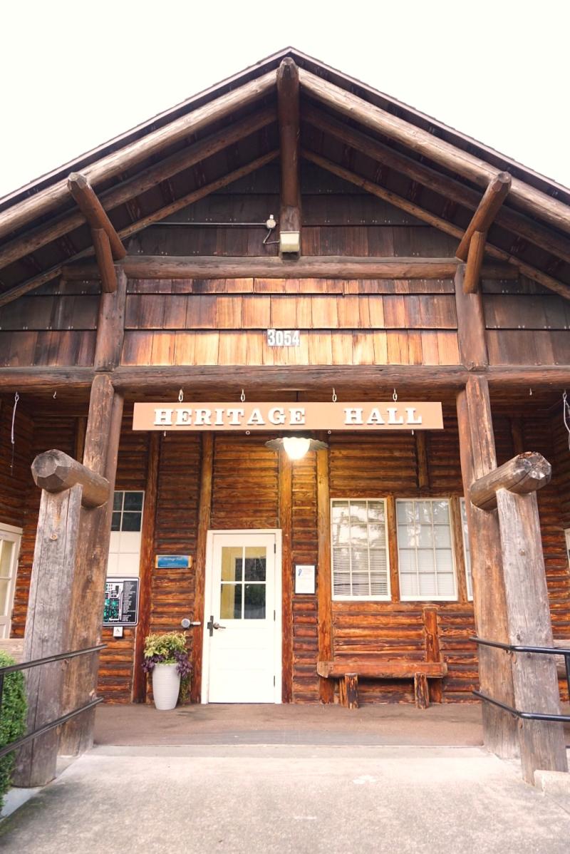 Front entrance to Heritage Hall log cabin building 