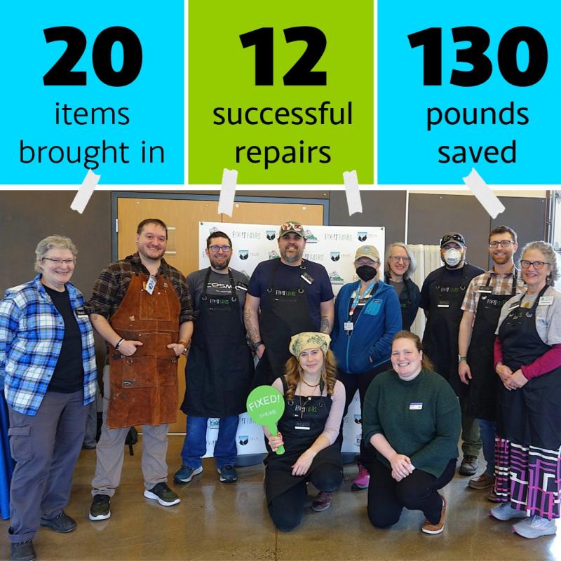 A group of volunteers pose for a photo.