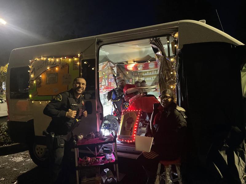Photo of Sheriff Sanders with 2025 Trunk or Treat winner