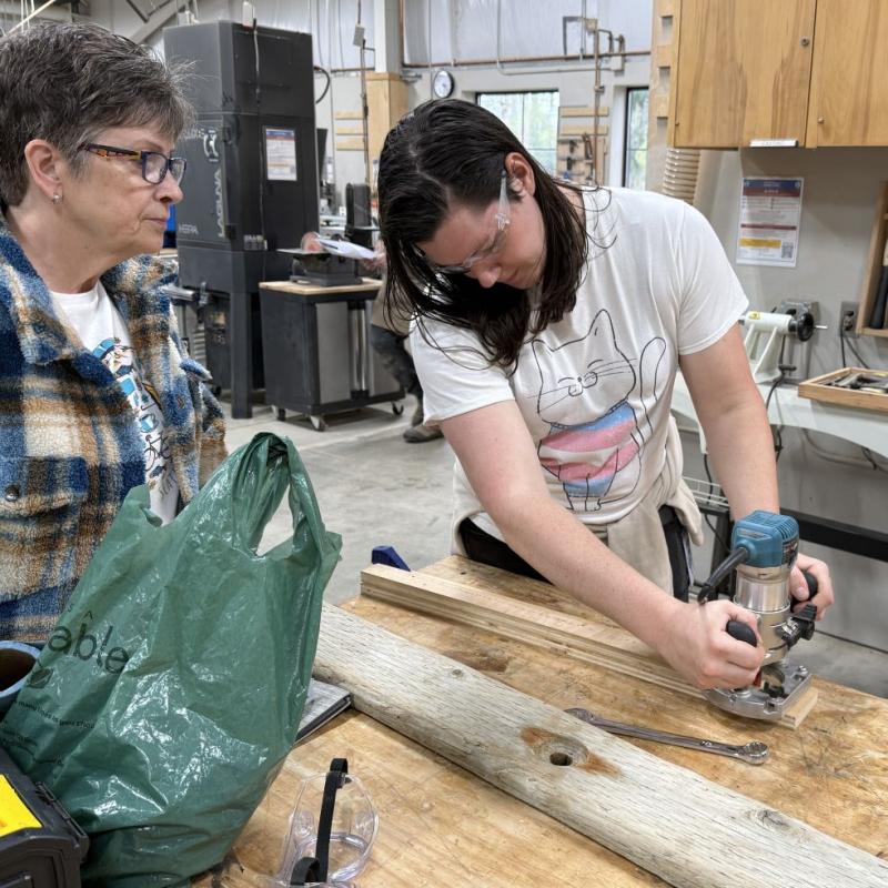 A plunge router is used to repair a broken item.