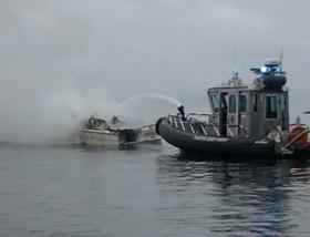 TCSO MSU Boat extinguishing fire