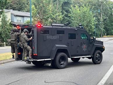 SWAT VEHICLE WITH OPERATORS