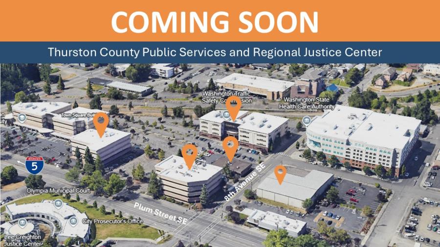Overhead photo of multiple buildings in Downtown Olympia between Plum Street and Eighth Avenue.