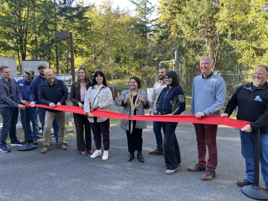 photo of thurston county commissioners cutting a ribbon at an event celebrating a community infrastructure upgrade