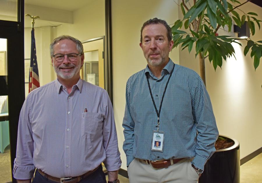 image is a photo of Thurston County Treasurer Jeff Gadman standing next to Thurston County Banking and Investment Officer Rodney Reynolds.
