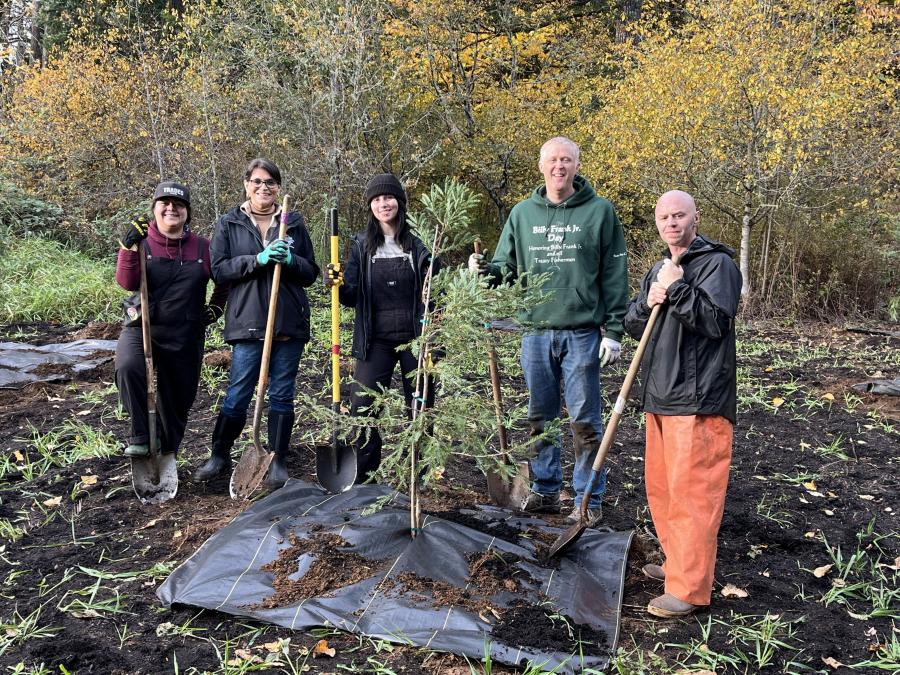 photo of thurston county's five elected board members with shovels at a tree planting project