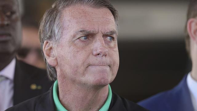 Brazil's former President Jair Bolsonaro gives a press conference outside the Senate in Brasilia, Brazil, Thursday, July 17, 2025. (AP Photo/Luis Nova)