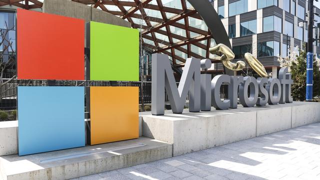 A Microsoft sign and logo are pictured at the company's headquarters, Friday, April 4, 2025, in Redmond, Wash. (AP Photo/Jason Redmond, File)