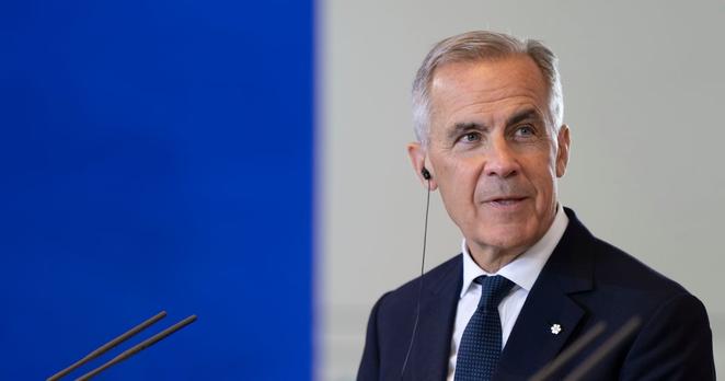 Prime Minister Mark Carney speaks during a joint media availability with German Chancellor Friedrich Merz (not shown) at the Federal Chancellery in Berlin, Germany on Tuesday, Aug. 26, 2025. THE CANADIAN PRESS/Christinne Muschi